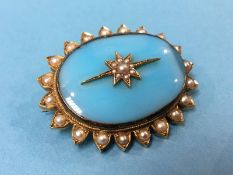 A yellow metal brooch, mounted with seed pearls