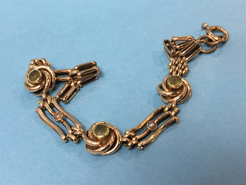 A bracelet, stamped '15ct' mounted with seed pearls etc. 10g