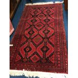 A modern Persian design rug, 191cm x 97cm