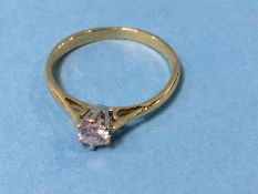 An 18ct gold diamond solitaire ring, size 'O', 2.4g