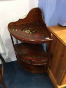 A reproduction mahogany corner wash stand