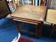 A teak nest of tables