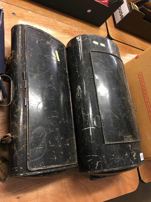 Two tin cases