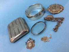 A silver cigarette case, bracelet etc.