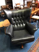 A G Plan model 62 Blofeld winged swivel armchair