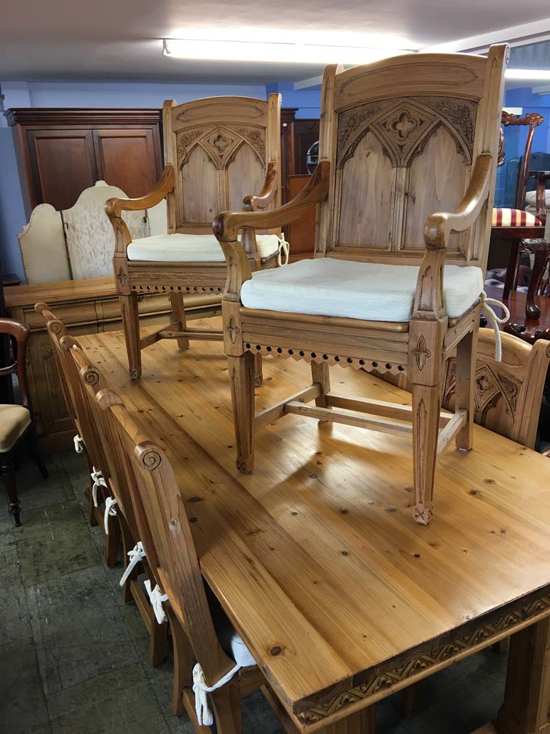 A pine Gothic style Farmhouse dining table, sideboard and eight chairs, comprising six single and - Image 2 of 3