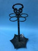 A metalwork stick stand