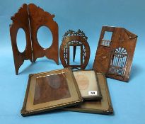 Three decorative souvenir wooden photo frames and three others