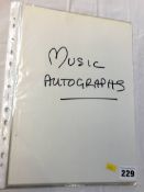 Music autographs; a collection of 11 individuals and groups, including Bob Dylan, Glen Campbell,