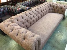 An Edwardian four seater Chesterfield settee (newly reupholstered)