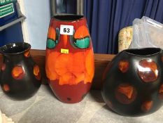 Three Poole vases