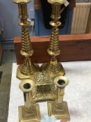 Two pairs of candlesticks and an inkwell