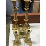 Two pairs of candlesticks and an inkwell