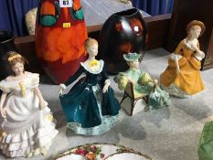 Four Royal Doulton figures