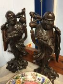 Pair of Oriental Rootmen figures