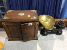 Oak smokers cabinet with a set of weights and scales