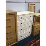 Three modern chest of drawers and a chair