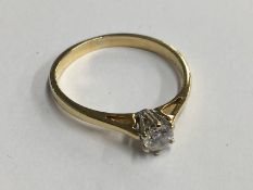 Gold (marks rubbed) diamond solitaire ring