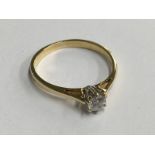 Gold (marks rubbed) diamond solitaire ring