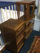 Oak tea trolley, teak nest of tables and a record cabinet