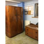 Two walnut wardrobes and a dressing chest