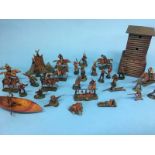 Large collection of Elastolin, Germany Cowboy and Indian figures (30) with two campfires, canoe,