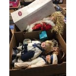 Two boxes of dolls