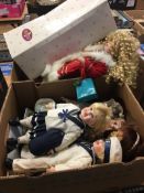 Two boxes of dolls