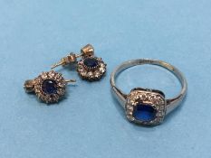 A ring stamped Platinum, mounted with sapphire and diamonds, with a similar pair of earrings