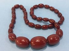 A string of amber coloured beads, approx. 30g