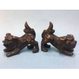 Pair of bronze style Dogs of Fo