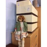 Four boxed dolls