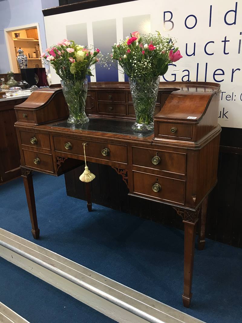 A reproduction mahogany Carlton House desk