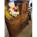 A two drawer side cabinet and a small table