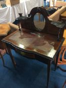 An Edwardian mirror backed ladies writing desk