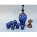 A seven piece liquor set, together with a small vase