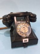 A Bakelite Deco telephone