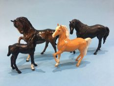 Four Beswick horses