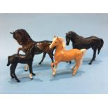 Four Beswick horses