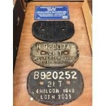 Four metal railway signs