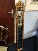 Narrow gilt mirror