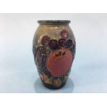 A small Moorcroft vase