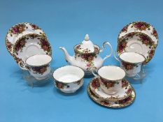 A Royal Albert Old Country Roses tea set and vase