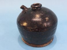 A treacle glaze stoneware flagon