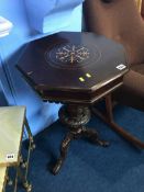 A Victorian walnut octagonal sewing box