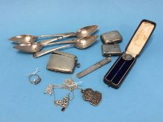 Three silver vestas, 4 silver grapefruit spoons etc.