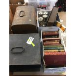 A selection of old books, two tin boxes etc.