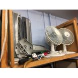 Three desk fans, three standing tower fans and selection of brollies