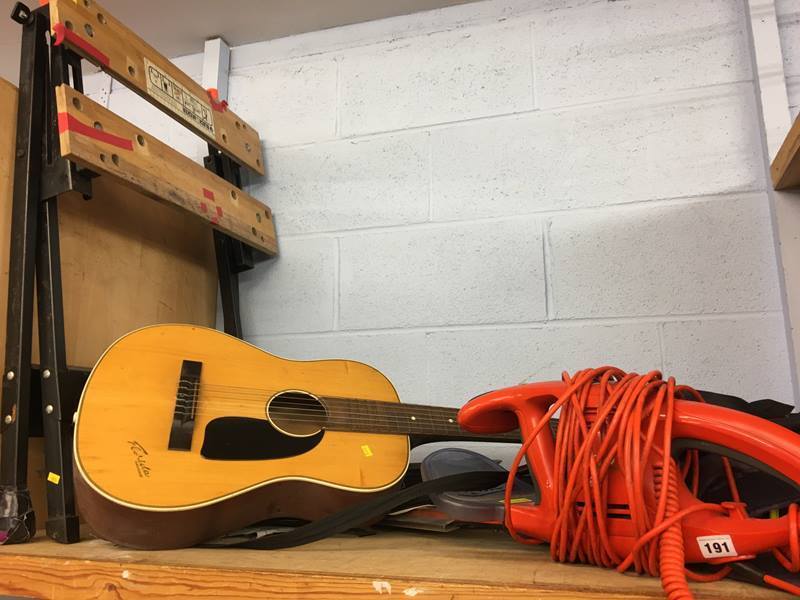 A Black and Decker workbench, Flymo hedge trimmer and classical guitar