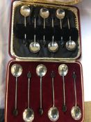 Silver coffee spoons and a set of Harrods coffee spoons